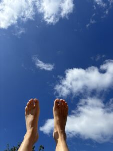 Bare feet. Blue sky. Some memories don't stay in our minds. They stay in our bodies.